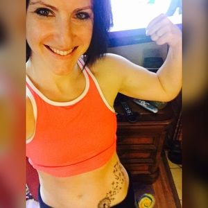 Crop sports top/bra with white trim.